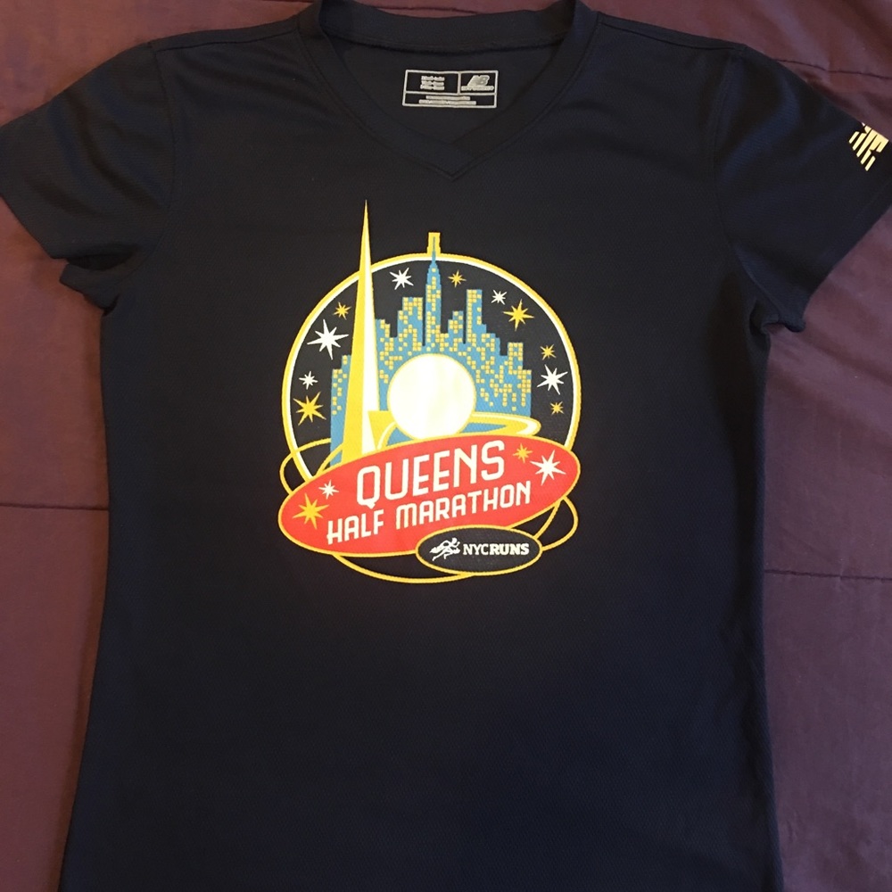 Woman sports T-shirt blue NYCRUNS Queens size XS